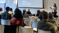 A CCME faculty member giving a lecture on ethics
